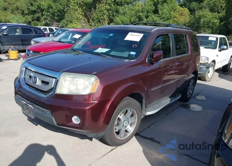 2011 Honda Pilot Touring z USA, uszkodzony, nr VIN 5FNYF3H90BB030206